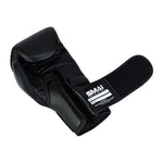 A black Memory Tec Leather Boxing Glove by SMAI, with an open palm and Velcro wrist strap featuring the "SMAI" logo, is displayed on a white background.