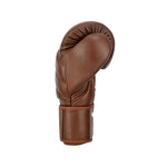 The SMAI Memory Tec Leather Boxing Glove - Antique Brown is displayed upright with its thumb curled around the front, set against a plain white background.