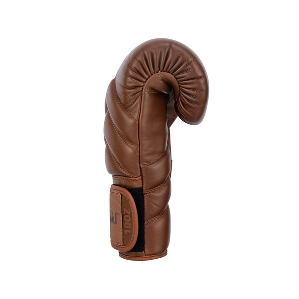 The SMAI Memory Tec Leather Boxing Glove - Antique Brown features visible stitching and Memory Tech foam, standing upright in a curved shape against a plain white background.