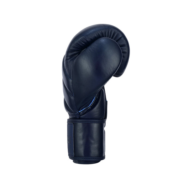 The SMAI Memory Tec Leather Boxing Glove in Navy Blue is displayed upright against a plain white background, with the palm side facing inward and the thumb visible along the side.