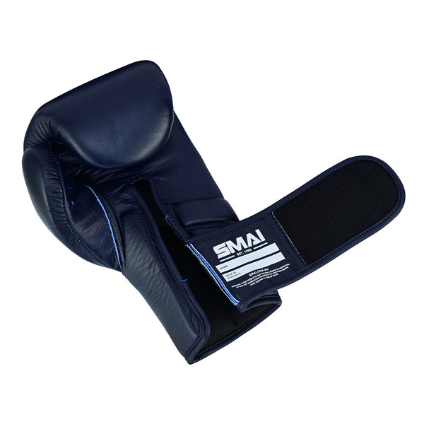 A single SMAI Memory Tec Leather Boxing Glove in navy blue cowhide, featuring a partially open Velcro strap and the SMAI brand label on the wrist.