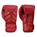 The SMAI Memory Tec Leather Boxing Glove in Crimson Red features durable cowhide leather. Shown side by side, one reveals the palm with a Velcro strap; the other displays detailed stitching and the SMAI logo on top.