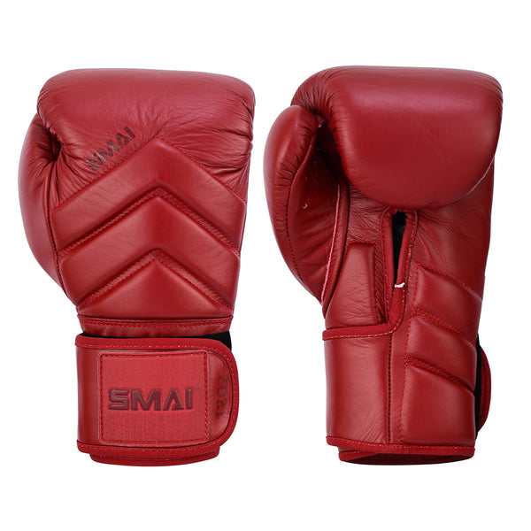 The SMAI Memory Tec Leather Boxing Glove in Crimson Red features durable cowhide leather. Shown side by side, one reveals the palm with a Velcro strap; the other displays detailed stitching and the SMAI logo on top.