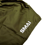 Olive green, quick-dry SMAI Muay Thai Shorts - Olive Green featuring the brand name printed in white on the lower corner.