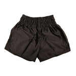 SMAI Muay Thai Shorts - Black: Unisex shorts made from satin polyester with an elastic waistband, shown laid flat on a white background.