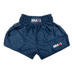 SMAI Muay Thai Shorts - Navy: Unisex satin polyester shorts with a high elastic waistband, white/red/blue "SMAI" logo, and wide leg design for ease of movement.