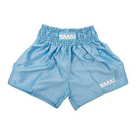 The SMAI Muay Thai Shorts - Sky Blue are unisex satin polyester shorts with a high elastic waistband and “SMAI” in white on the waistband and front left leg. These loose-fit shorts are shown against a white background.