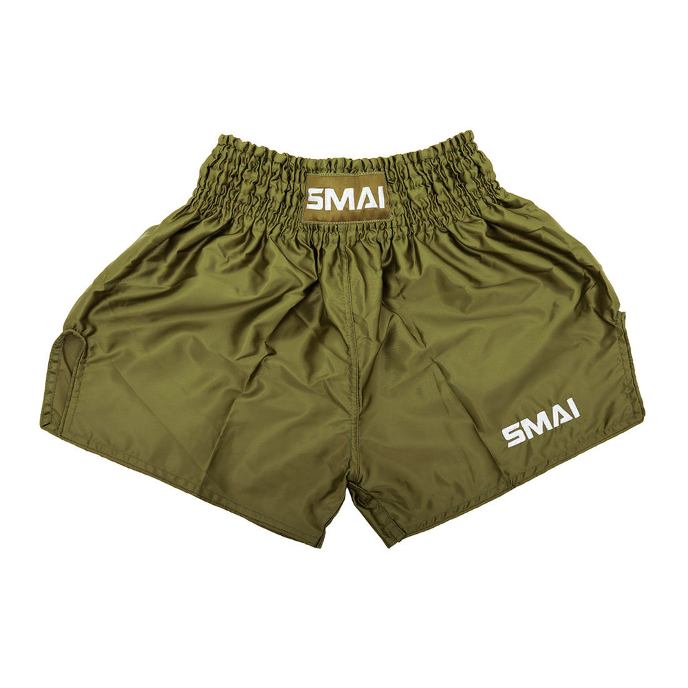 SMAI Muay Thai Shorts - Olive Green: unisex satin polyester shorts with an elastic waistband and white "SMAI" logos on the waistband and lower left leg, shown on a white background.