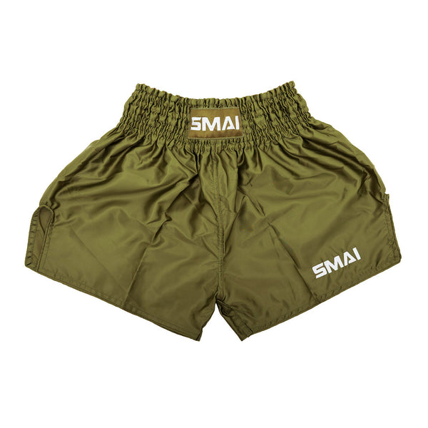 SMAI Muay Thai Shorts - Olive Green: unisex satin polyester shorts with an elastic waistband and white "SMAI" logos on the waistband and lower left leg, shown on a white background.