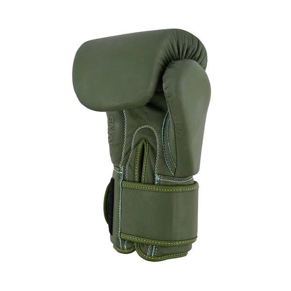The SMAI Elite85 Boxing Glove in olive green features visible stitching and padding for injury reduction, shown upright against a plain white background.