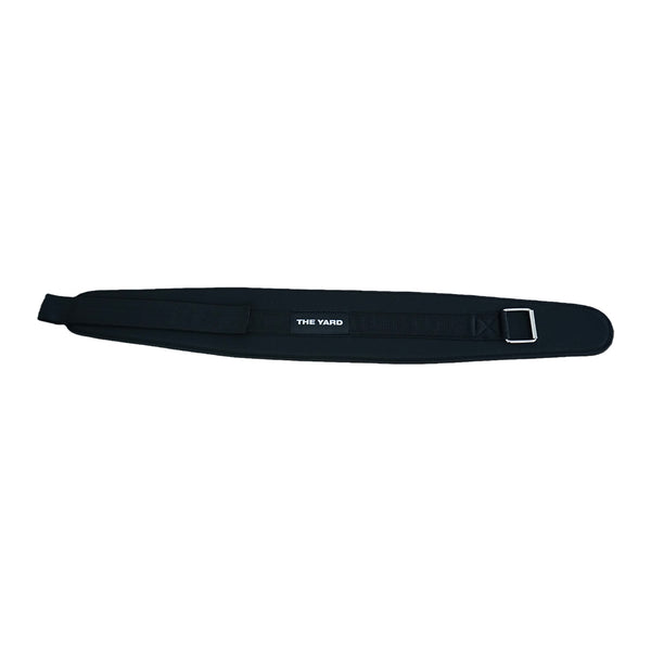 The SMAI The Yard - Nylon Weightlifting Belt (Large) is a black padded adjustable belt with “THE YARD” in white at the center, offering strong lower back support and a sturdy metal buckle for weightlifting.