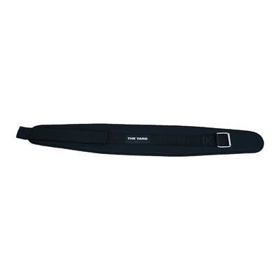 The SMAI The Yard - Nylon Weightlifting Belt (Medium) is a black, padded, adjustable belt with a metal buckle and "THE YARD" printed in white on the front, designed for optimal core support.