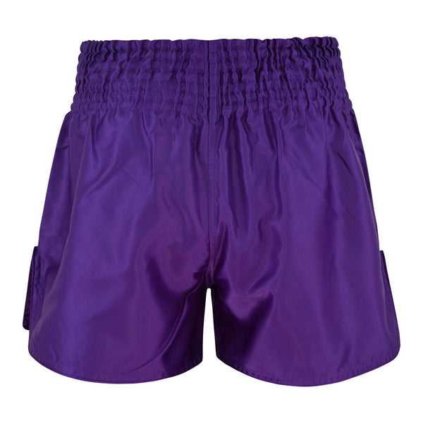SMAI Muay Thai Shorts - Purple, featuring a unisex fit and an elastic waistband, are displayed from the back against a white background. The smooth, shiny fabric has no visible logos or patterns.