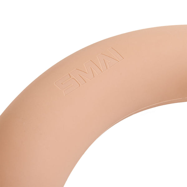 A close-up of the SMAI Pilates Weighted Bar Blush Pink 7kg shows its beige circular end with "SMAI" embossed, featuring a smooth finish and partially visible against a white background.