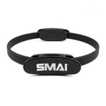 A commercial-grade black Pilates/Yoga Ring by SMAI, featuring the brand name in white on the front, ideal for resistance training or Pilates workouts, displayed against a plain white background.