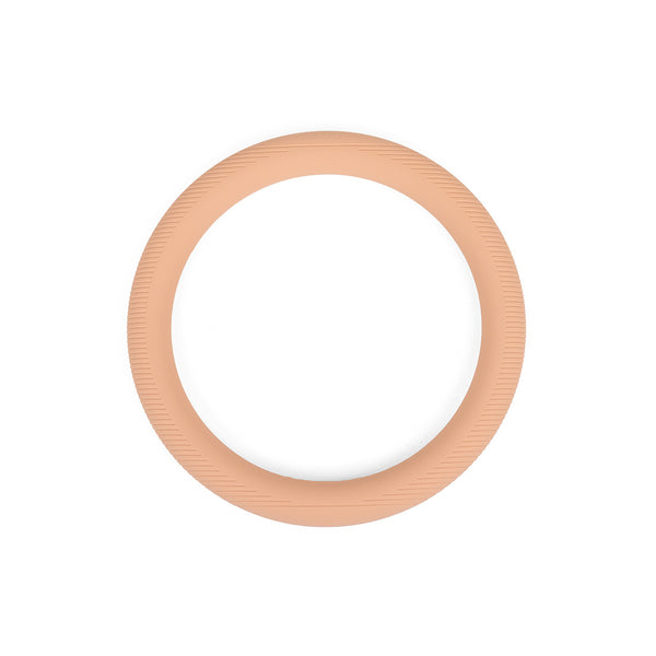 The SMAI Pilates Power Ring Blush Pink 4.5kg is a silicone-covered fitness ring in blush pink, featuring subtle textured lines along its outer edge, displayed against a white background.