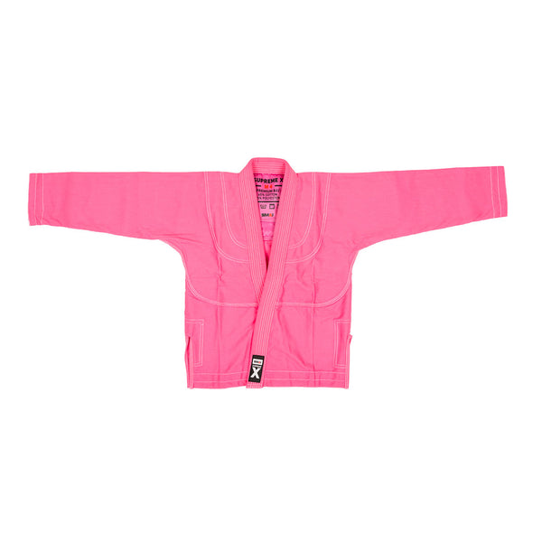 The SMAI Supreme X Brazilian Jiu Jitsu Uniform - Pink features a durable pearl weave long-sleeve gi jacket with a lapel, shown against a white background.