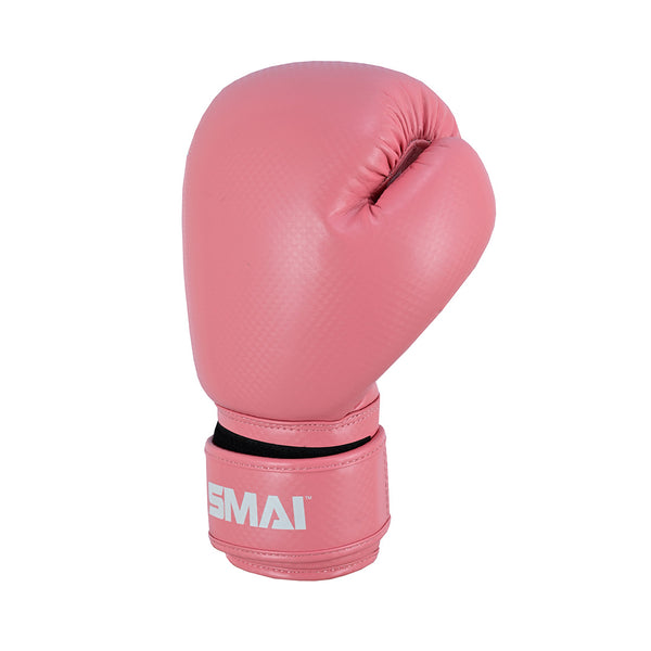 The PRE ORDER: Essentials Kids Boxing Glove - Pink by SMAI is a single synthetic leather kids glove with a white "SMAI" logo on the Velcro wrist strap, displayed against a white background.