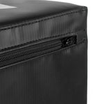 Close-up of the black zippered edge on a durable SMAI Plyometric Box - Pre-Assembled, often used for athlete safety gear. The zipper is slightly open, showcasing the structure and texture of the sturdy material. The fabric has a matte finish with visible stitching details.