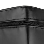 Close-up of a black, rectangular SMAI WOD Box Pro Foam Plyo Box (20"/24"/30"), showing visible stitching and a horizontal zipper on the side. The smooth, slightly shiny material is typical of competition-grade plyometric boxes from SMAI.