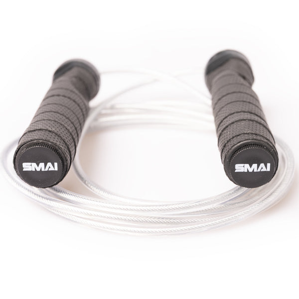 SMAI Skipping Rope with Weighted Handles featuring textured black handles and a clear coated wire cable.