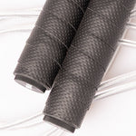 Two textured, weighted handles for the SMAI Skipping Rope with Weighted Handles, shown with silver cables.