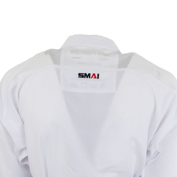 Close-up of the back of an unworn SMAI WKF Karate Uniform Pack - 8oz Premium Kumite Gi - Pro Fighter, featuring a mesh panel and "SMAI" logo in black and red on the upper back; figure is facing away.