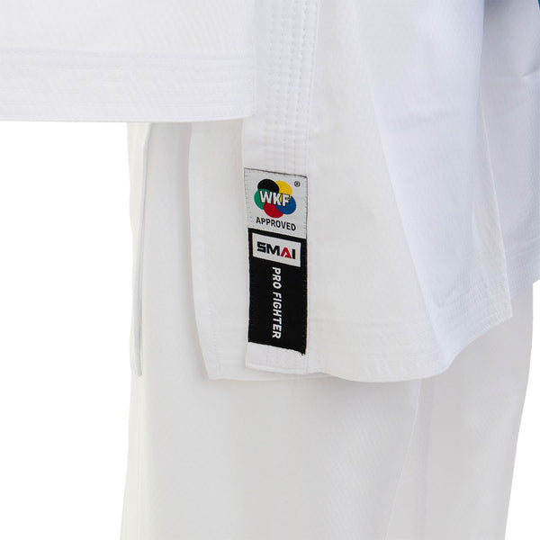 Close-up of the SMAI WKF Karate Uniform Pack - 8oz Premium Kumite Gi - Pro Fighter, with "WKF Approved," "SMAI," and "Pro Fighter" tags on the hem, highlighting its lightweight design ideal for Kumite competitions.