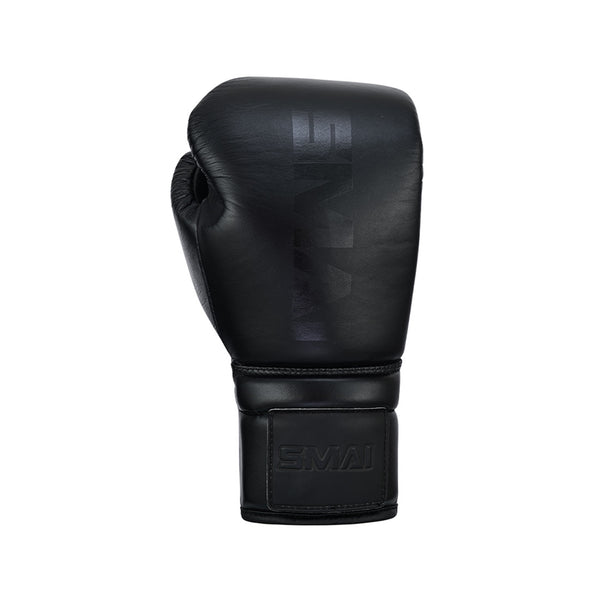 The SMAI Pro Series Leather Lace-Up Boxing Glove in black, made from premium cowhide, features the brand name on the wrist strap and front. Designed for superior impact absorption, it stands upright against a plain white background.