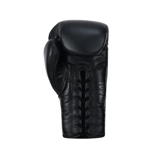 The SMAI Pro Series Leather Lace-Up Boxing Glove - Black is displayed upright with visible front laces, expertly crafted from premium cowhide leather and isolated on a white background.