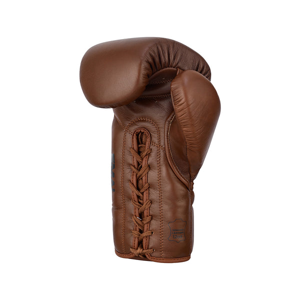 The SMAI Pro Series Leather Lace-Up Boxing Glove in Antique Brown is shown upright against a white background, featuring premium brown cowhide leather and front laces.