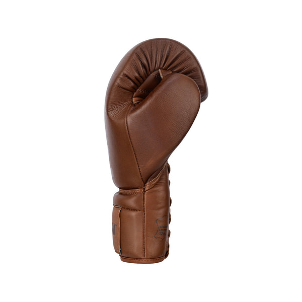 The SMAI Pro Series Leather Lace-Up Boxing Glove in Antique Brown is displayed upright against a white background, showcasing its brown cowhide leather, visible stitching details, and tucked-in thumb.