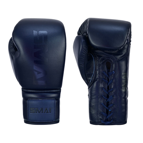 The SMAI Pro Series Leather Lace-Up Boxing Gloves in Navy Blue feature secure inner wrist laces for a snug fit and optimal impact absorption, with one glove shown front-on and the other from the side, displaying the "SMAI" logo.