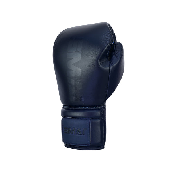 A single SMAI Pro Series Leather Lace-Up Boxing Glove in navy blue is shown upright against a plain white background, with the brand name visible.