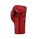 The SMAI Pro Series Leather Lace-Up Boxing Glove in Crimson Red features visible palm laces and bold black printed text and logos, displayed upright against a white background.