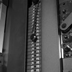 Free Standing Cable Tower Lat Pull / Low Row close up of weight stack