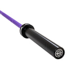 Close-up of the SMAI Barbell - Purple Ceramic Coat - 15kg, featuring a black sleeve, purple shaft, and branded end cap. The rust-resistant barbell showcases its durable sleeve and end cap design.