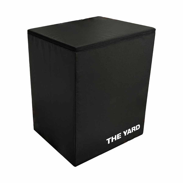 The SMAI WOD Box Pro - Foam Plyo Box (20"/24"/30") by SMAI is a black rectangular, competition-grade plyo box with "THE YARD" in white on one side, shown against a white background.