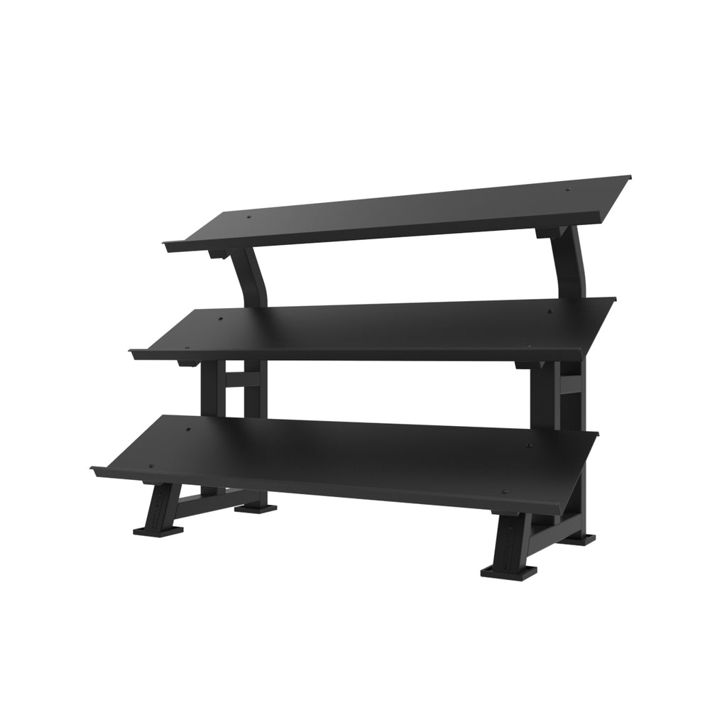 The SMAI The Yard Dumbbell Rack - 3 Tier is a black, modern rack with angled shelves and sturdy metal legs. Designed to resemble studio furniture, it offers minimalist style and displays on a white background.