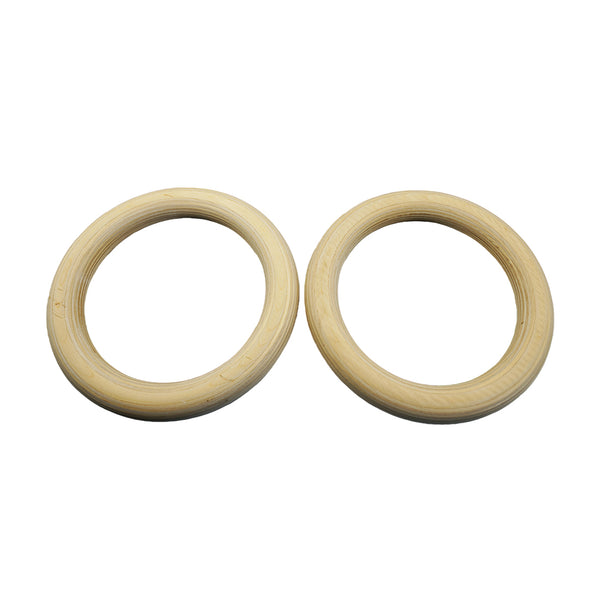 The Yard - Wooden Gym Rings with Numbered Straps by SMAI are two light-colored wooden rings placed side by side on a white background, featuring numbered straps for easy length adjustment.