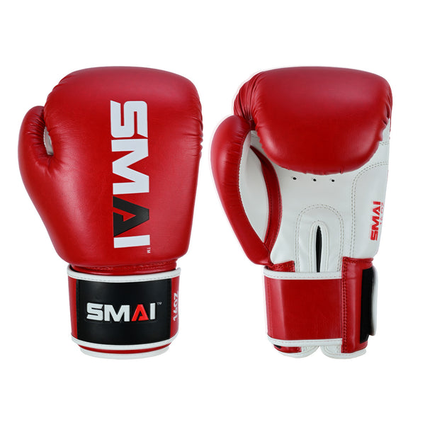A pair of SMAI Essentials Red Boxing Gloves are displayed, one palm up and one palm down, showcasing black wrist straps with the white SMAI logo.