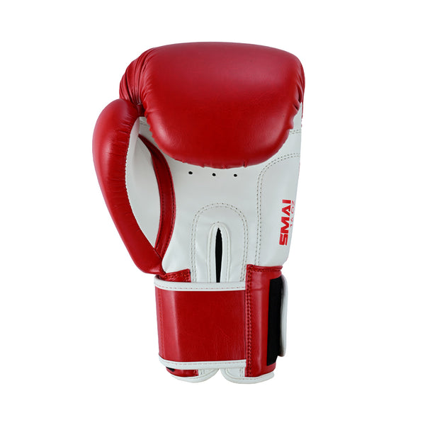 The SMAI Essentials Red Boxing Glove features a red and white design with a Velcro strap, shown upright on a plain white background—ideal training gloves for athletes of all levels.
