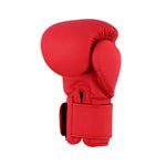 A single SMAI Gold Series Boxing Glove - Red/Gold, featuring a velcro wrist strap and designed for superior shock protection, is displayed upright against a plain white background.