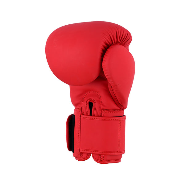 A single SMAI Gold Series Boxing Glove - Red/Gold, featuring a velcro wrist strap and designed for superior shock protection, is displayed upright against a plain white background.