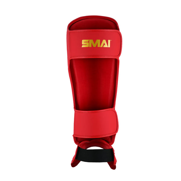 SMAI Gold Series Muay Thai Shin Guards - Red/Gold offer multi-layer EVA protection, two adjustable straps, and a black elastic foot loop—ideal for martial arts or sports protection.