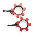A pair of red, gear-shaped SMAI Aluminium Lock 50mm Collars with black levers are shown on a white background. These collars securely fasten Olympic weight plates to barbells during lifting.