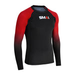 The SMAI Long Sleeve Rash Guard - Red features a black body, red-to-black gradient sleeves, and "SMAI" printed in white, red, and gray on the chest. Designed for no-gi grappling with advanced compression. Shown on a plain white background.