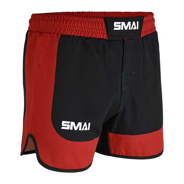 The SMAI MMA Grappling Shorts - Black / Red feature a durable polycotton build, elastic waistband, and velcro strap, with "SMAI" in white on the left leg and waistband for a striking look.