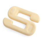 A beige S-shaped weight from No Sync To Channel Engine, labeled "SBELL Chalk 4kg," is perfect for free weight training, lying elegantly on a white background.