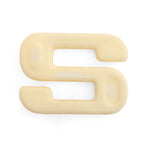 The image showcases a beige, S-shaped SBELL Starter pack from No Sync To Channel Engine, ideal for home gym setups. It has "4 KG" embossed on both ends and features a simple, monochromatic design against a clean white background, perfect for free weight training.